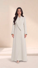 The Buthaina Wide Shawl Collar Abaya, in Off White, front view