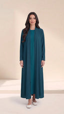 The Nashwa Scalloped Front Edge Abaya, in Teal, front view