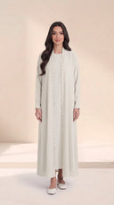 The Nashwa Scalloped Front Edge Abaya, in Off White, front view