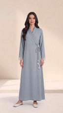 The Hawra Side-Tie Wrap Abaya, in Blue, front view