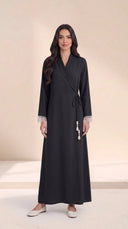 The Hawra Side-Tie Wrap Abaya, in Black, front view