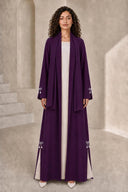 The Fadwa Pearl Bow Slit Abaya, in Dark Purple, front view