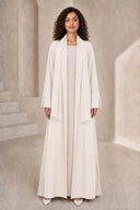 The Fadwa Pearl Bow Slit Abaya, in Off White, front view