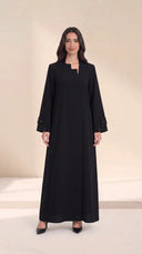 The Ghalia Asymmetric Step Neck Abaya, in Black, front view