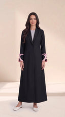 The Hadiya Ruffled Bow Cuff Abaya, in Black, front view