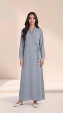 The Hawra Side-Tie Wrap Abaya, in Blue, front view