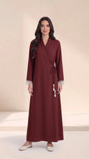 The Hawra Side-Tie Wrap Abaya, in Burgundy, front view
