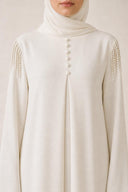 The Mounira Pearl Fringe Shoulder Abaya, in Off White, detail view