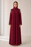 The Mounira Pearl Fringe Shoulder Abaya, in Burgundy, front view