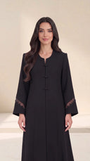 The Rimas Frog Button Front Abaya, in Black, front view