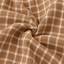 Close-up of The Suha Soft Linen Open Front Check Abaya fabric, featuring a warm brown and white check pattern with a textured linen finish.