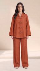 The Zakiya Pearl Frog Fastening Set, in Burnt Orange, front view