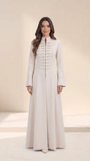 The Najat Military Pleat Front Abaya, in Off White, front view