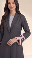 The Hadiya Ruffled Bow Cuff Abaya, in Grey, detail view