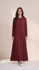 The Dhabia Pleated Side Panel Abaya, in Burgundy, front view