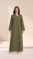 The Ghalia Asymmetric Step Neck Abaya, in Green, front view