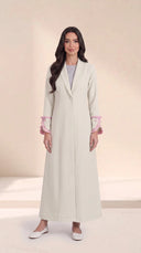 The Hadiya Ruffled Bow Cuff Abaya, in Off White, front view
