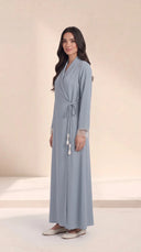 The Hawra Side-Tie Wrap Abaya, in Blue, side view