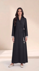 The Hawra Side-Tie Wrap Abaya, in Black, front view