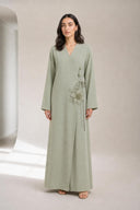 The Kareema 3D Floral Wrap Abaya, in Sage, front view
