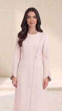 The Lamees Asymmetric Button Abaya, in Pink, front view