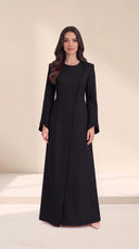 The Lamees Asymmetric Button Abaya, in Black, front view