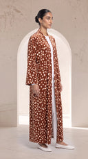 The Mayada Rust Fawn Spot Print Abaya, in Rust, side view