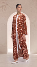 The Mayada Rust Fawn Spot Print Abaya, in Rust, side view