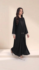 The Mayasa Black Pearl Fringe Cuff Abaya, in Black, model view