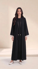The Mayasa Black Pearl Fringe Cuff Abaya, in Black, front view
