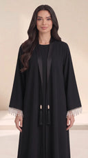 The Mayasa Black Pearl Fringe Cuff Abaya, in Black, front view