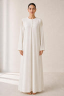 The Mounira Pearl Fringe Shoulder Abaya, in Off White, front view