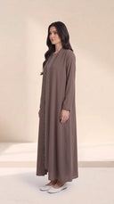 The Nashwa Scalloped Front Edge Abaya, in Mocha Brown, side view