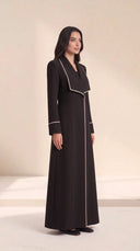 The Nuha Piped Wide Lapel Abaya, in Black, side view