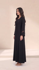 The Rimas Frog Button Front Abaya, in Black, side view