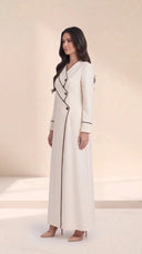 The Roaa Tiered Asymmetric Button Abaya, in Off White, side view