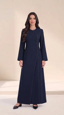 The Samira Curved Asymmetric Button Abaya, in Navy, front view