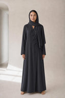 The Shahad 3D Leaf Appliqué Abaya, in Grey, front view