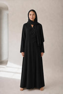 The Shahad 3D Leaf Appliqué Abaya, in Black, front view