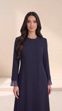 The Sundus Asymmetric Button Abaya, in Navy, front view