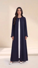 The Zeina Pom-Pom Cuff Abaya, in Navy, front view